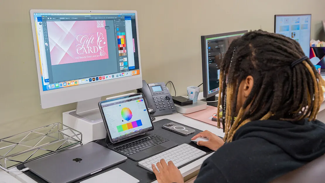 Designer sketching a salon logo